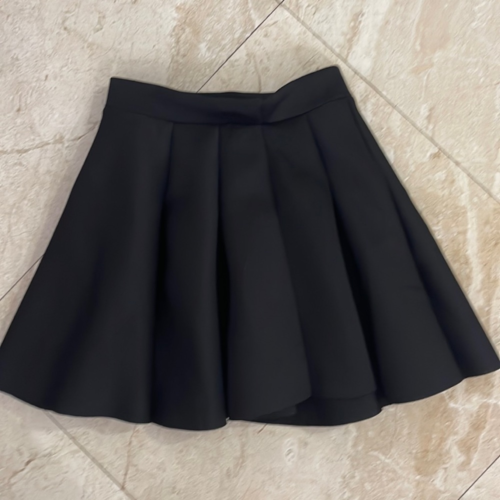 Gorgeous, flattering black skater skirt. One size left - medium.